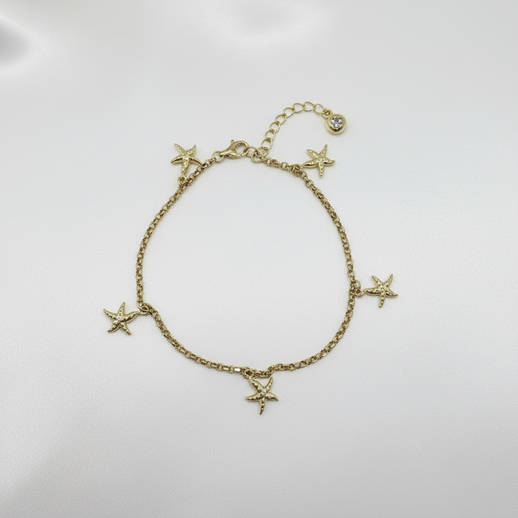 Pulsera con colgantes 10k