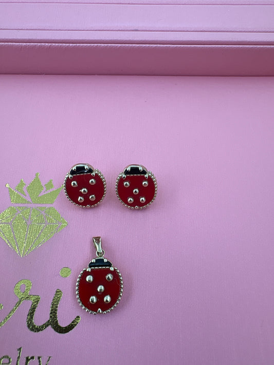 Set de aretes y dije mariquita