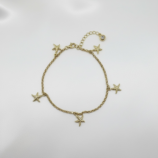 Pulsera con colgantes 10k