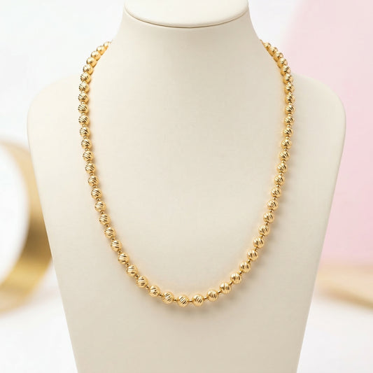 Collar de Oro con Cuentas Texturizadas - Elegancia Atemporal