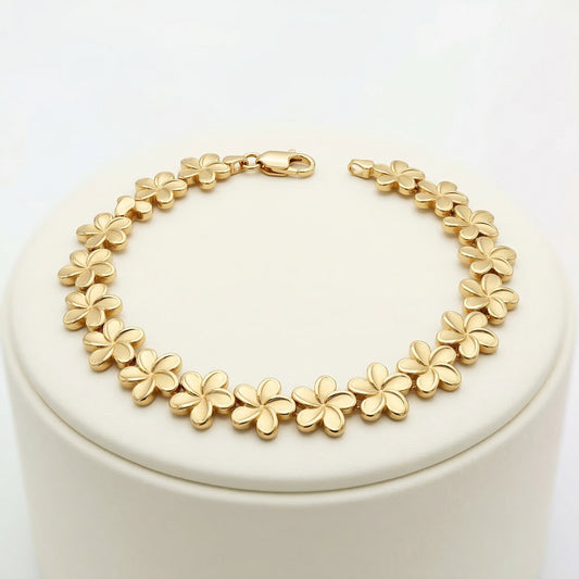 Pulsera de Flores Plumeria en Oro 14k - Elegancia Tropical Sofisticada